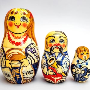 This is set of 3 dolls different size This nesting dolls is hand-painted. Thy are great ethnik decor in your house or office