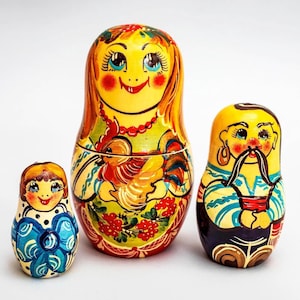 This is set of 3 dolls different size This nesting dolls is hand-painted. Thy are great ethnik decor in your house or office