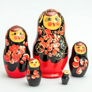 This is set of 5 dolls different size This nesting dolls is hand-painted Thy are great ethnik decor in your house or office