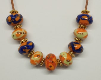 Handmade Lampwork / Torchwork Glass Bead Necklace - Opaque Orange with Trails of Cobalt Blue, Grasshopper Green & Red with Added Copper Frit