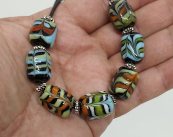 Handmade Lampwork / Torchwork Glass Bead Necklace Featuring Colorful Raking Decoration Over Opaque Black Glass Beads - Ancient Style Glass