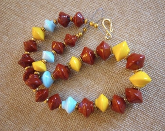 Handmade Lampwork / Torchwork Glass Bead Choker Necklace - Opaque Deep Red, Canary Yellow and Light Blue Biconical Beads - 16 Inches Long