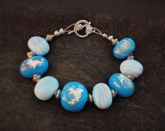 Handmade Lampwork Glass Bead Bracelet in Opaque Marbled Blue & Semi-Opaque Ocean Blue Enhanced with Silver Leaf - Glass Art You Can Wear