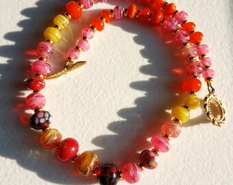 Handmade Lampwork / Torchwork Glass Bead Necklace in Red, Pink and Yellow Glass with Gold Plated Spacer Beads and Toggle Closure