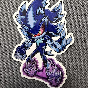 May include: A sticker featuring a blue and purple cartoon character with sharp teeth and claws. The character has red eyes and is in a menacing pose.
