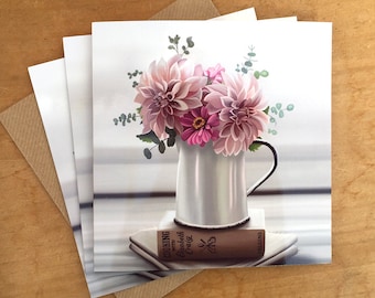 Blank greetings card featuring jug of dahlias