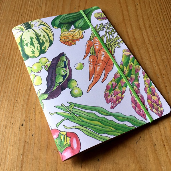Garden vegetables notebook, pocket sized, ruled with an original illustrated cover and recycled paper.
