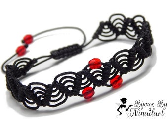 Adjustable hand woven black bracelet with red crystal beads