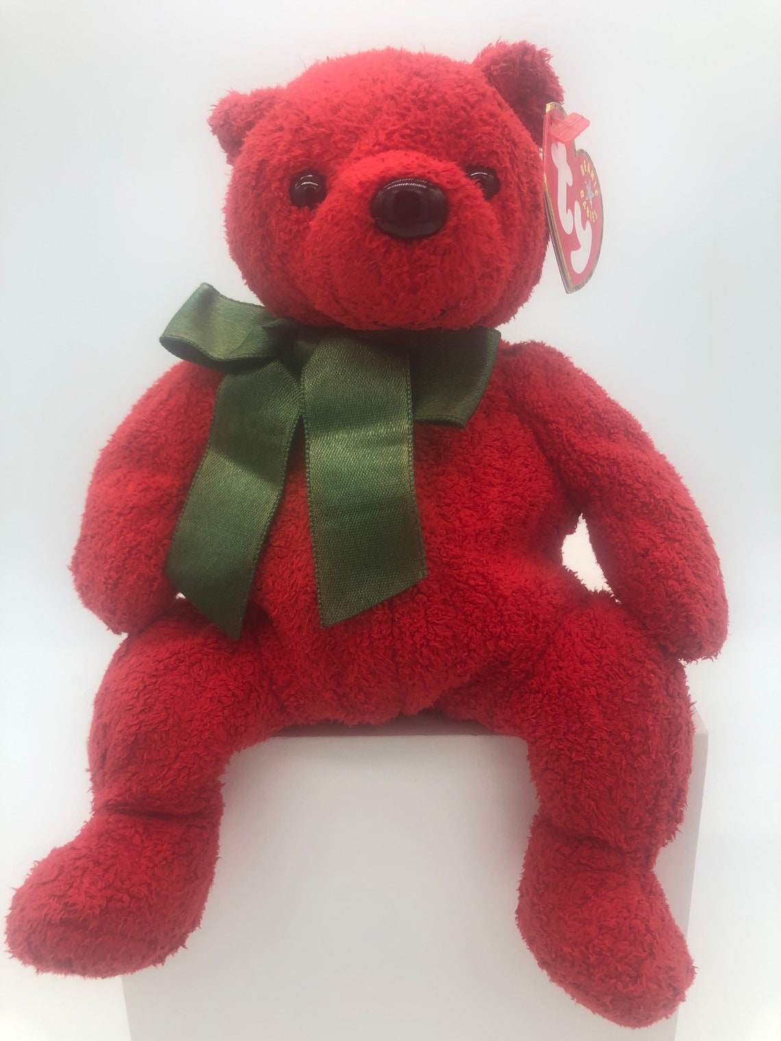 purple teddy bear made of roses