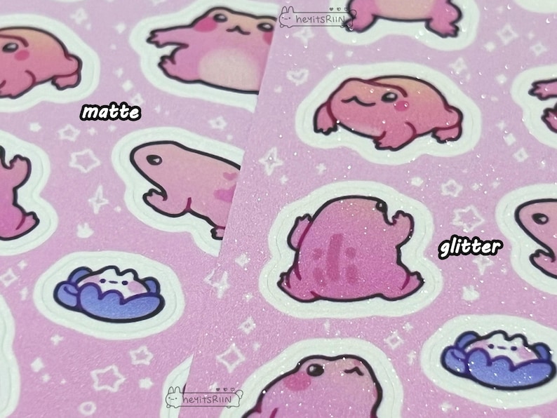 May include: Pink frog stickers with glitter and matte finishes. The stickers have a pink background with white stars and the words "matte" and "glitter" printed on them.