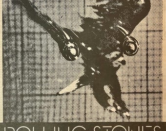 Anuncio promocional impreso original de la gira de conciertos vintage "Tour Of The Americas 75" de los Rolling Stones de 1975.