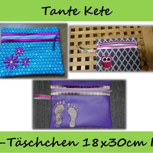 May include: Three different zippered pouches with various designs. The first pouch is blue with white polka dots and pink flowers. The second pouch is grey with a white diamond pattern and a pink owl. The third pouch is purple with a silver footprint design. The pouches are all 18 x 30 cm and are labelled "RV-Täschen 18 x 30cm ITH".