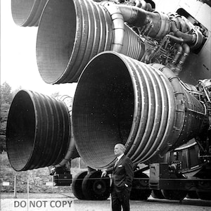 Wernher Von Braun Stands by Engines of the Saturn V on Display at the U.S. Space and Rocket Center - 5X7, 8X10 or 11X14 NASA Photo (EP-346)