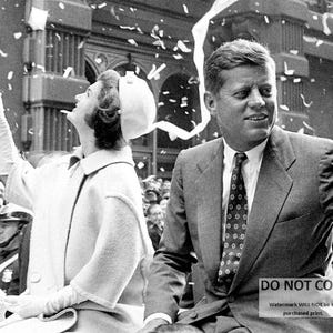 Senator John F. Kennedy and Wife Jacqueline Ride in a New York City Ticker-Tape Parade in October, 1960 - 5X7, 8X10 or 11X14 Photo (AA-998)