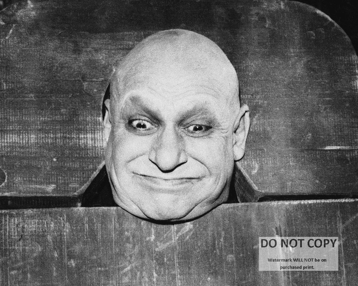 Jackie Coogan as Uncle Fester Photo Print: The Addams Family