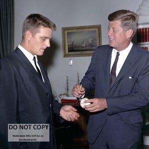 President John F. Kennedy Autographs a Baseball for New York Yankees Outfielder Roger Maris - 5X7 or 8X10 Photo (AB-504)