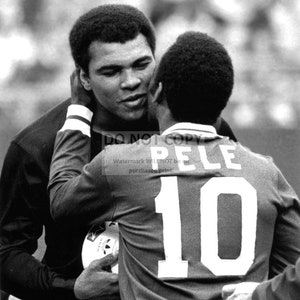 Pele Greets Muhammad Ali Before a New York Cosmos Soccer Game - 5X7, 8X10 or 11X14 Photo (EP-631)