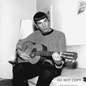 Leonard Nimoy as &quot;Mr. Spock&quot; Playing a Guitar - 5X7, 8X10 or 11X14 Publicity Photo (ZZ-578)