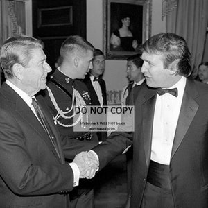 President Ronald Reagan Greets Donald Trump During a 1987 Event at the White House - 5X7 or 8X10 Photo (XEE-149)