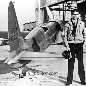 Howard Hughes Pilot and Business Magnate Standing Next to the Hughes H-1 Racer Aircraft - 8X10 or 11X14 Photo (MW-440)