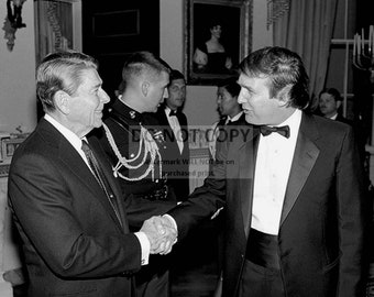 President Ronald Reagan Greets Donald Trump During a 1987 Event at the White House - 5X7 or 8X10 Photo (XEE-149)