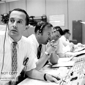 Capcom Charlie Duke With Jim Lovell & Fred Haise in Mission Control During the Apollo 11 Mission - 5X7, 8X10 or 11X14 NASA Photo (BB-757)