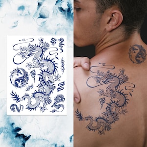 May include: A sheet of temporary tattoos featuring a blue dragon design. The sheet includes multiple smaller dragon designs and a larger dragon design. The sheet is shown next to a person's back with the larger dragon design applied as a tattoo.