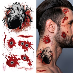 May include: A sheet of temporary tattoos featuring a bloody heart, bullet holes, and stitches. The tattoos are designed to look like injuries. The sheet is labelled "ST-130".