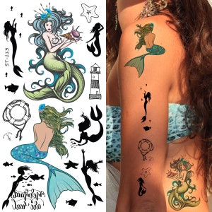 May include: A sheet of temporary tattoos featuring mermaids, lighthouses, and sea life. The tattoos are black and white with some color accents. The sheet includes the text "ST-113".