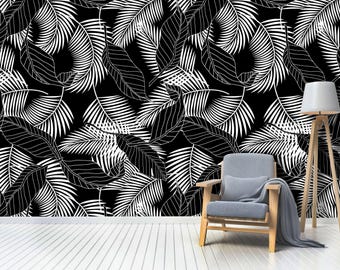 Stylish Tropical-themed Wallpaper with Palm and Banana Leaves on a Striking Black Backdrop