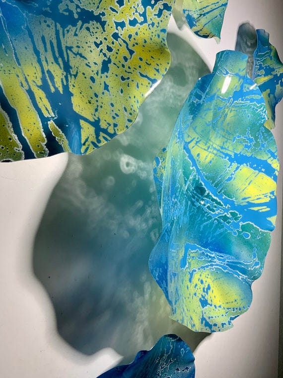 Handmade Recycled Plastic Wall Flower Sculpture: Blue, Yellow, and Off-White