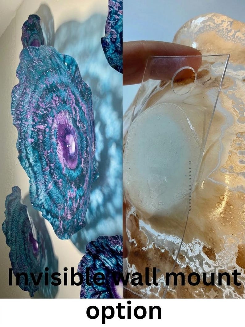 May include: A set of circular wall art pieces featuring swirling patterns of deep teal, blue, and purple hues. The right side shows a clear, transparent acrylic mounting bracket with a circular hole, labelled as an invisible wall mount option.
