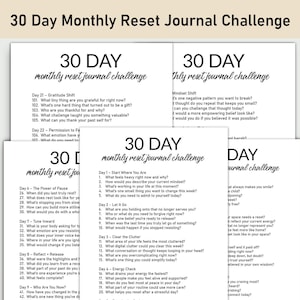 May include: A stack of white paper pages with the text "30 Day Monthly Reset Journal Challenge" in black. Each page contains prompts for daily journaling, designed for self-reflection and personal growth.