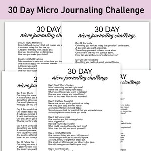 May include: A stack of white paper sheets with the text "30 Day Micro Journaling Challenge" in a handwritten font. Each sheet contains prompts for daily journaling, encouraging self-reflection and mindfulness. The top sheet has a pink header.