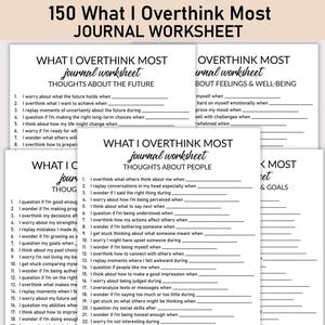 May include: A stack of white journal worksheets with the title "150 What I Overthink Most" in black. The worksheets have prompts for self-reflection, including thoughts about the future, feelings, and goals.