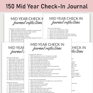 May include: A stack of white paper journals with the text "150 Mid Year Check-In Journal" at the top. Each journal page has a list of questions for self-reflection, with the title "Mid Year Check In journal reflections".