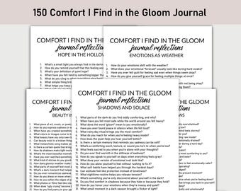 May include: A stack of white journal pages with prompts for self-reflection. The text "150 Comfort I Find in the Gloom Journal" is at the top. The journal prompts cover topics like emotions, shadows, and beauty.