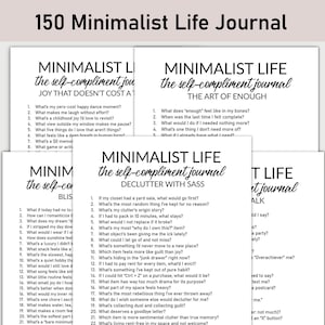 May include: A stack of white paper journals with black text. Each journal has a different title, including "Minimalist Life" and prompts for self-reflection. The journals are designed for self-compliment and decluttering.
