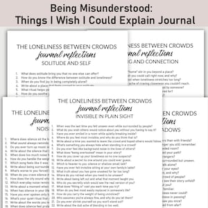 May include: A stack of white journal pages with prompts for self-reflection. The title "Being Misunderstood: Things I Wish I Could Explain Journal" is at the top. The journal prompts cover themes of solitude, connection, and feeling unseen.