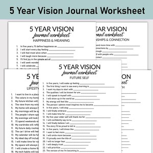 May include: A stack of white worksheets titled "5 Year Vision Journal Worksheet" with fill-in-the-blank prompts. The worksheets are designed to help users reflect on their future goals and aspirations, covering topics like happiness, lifestyle, and future self.