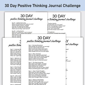 May include: A stack of white paper sheets with the text "30 Day Positive Thinking Journal Challenge" in a handwritten font. Each page contains prompts for daily reflection, encouraging positive thinking and self-awareness. The journal is designed to promote mental wellness.