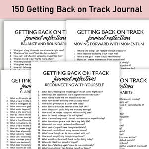 May include: A stack of white journals with black text, each featuring prompts for self-reflection. The top journal reads "150 Getting Back on Track Journal" in pink. The journals cover topics like balance, momentum, and habits.