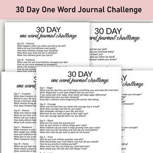 May include: A stack of white paper journal pages with prompts for a 30-day one-word journal challenge. The title "30 Day One Word Journal Challenge" is at the top. Each page has questions to inspire daily reflection.