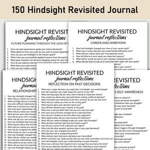 May include: A stack of white paper journals with the title "150 Hindsight Revisited Journal" in black text. Each journal has questions for self-reflection on topics like future planning, career, relationships, and past decisions.