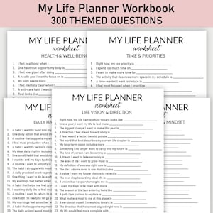 May include: A stack of white worksheets with black text, titled "My Life Planner Workbook" and "300 THEMED QUESTIONS." Each worksheet has prompts for self-reflection on health, time, and life vision. The worksheets are on a light pink background.