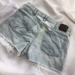 Vintage Lee shorts ripped jean shorts size 34