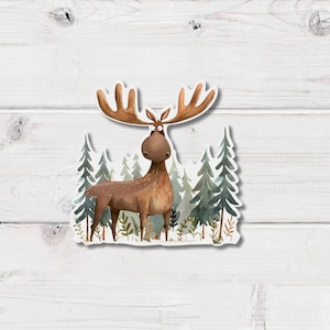 May include: A cartoon moose sticker with large brown antlers, set against a backdrop of stylised evergreen trees. The moose has a surprised expression. The trees are various shades of green and grey.