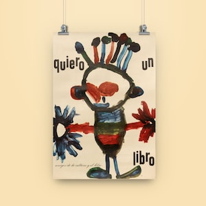 May include: A colorful poster with a child's drawing of a person holding out their arms. The drawing is in red, blue, green, and black paint. The text on the poster says "quiero un libro" which translates to "I want a book".