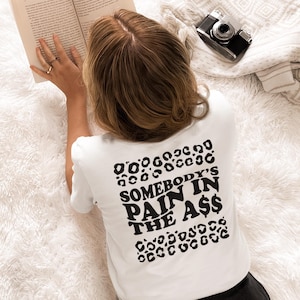 Somebody’s Pain in the Ass Tee, Customize Name