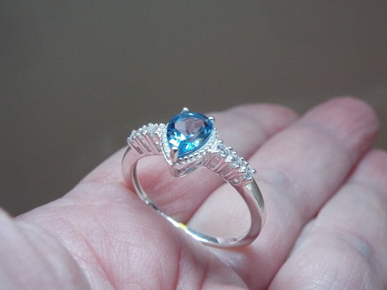 Details about   100% NATURAL SKY BLUE TOPAZ PRINCESS CUT GEMSTONE SOLID SILVER 925 RING SIZE 10